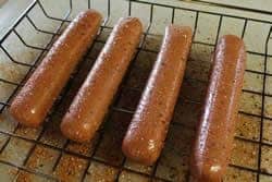 Hotdogs coated with rub - not spiral cut