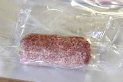 Place sausage into bag