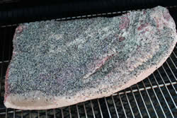 Brisket placed directly on grate of smoker