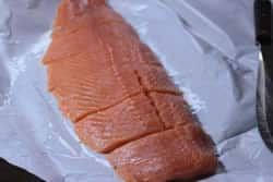 Cut salmon filet into pieces