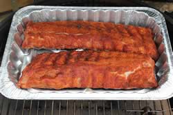 Ribs wrapped in foil or foil pan