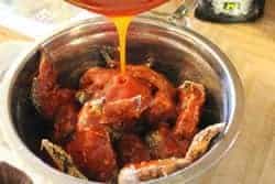 Pour sauce over wings